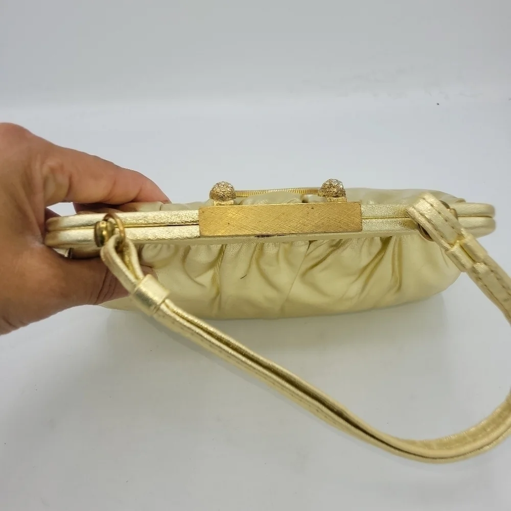 Vintage Andé Gold Clutch With Rhinestone Details Clasp.